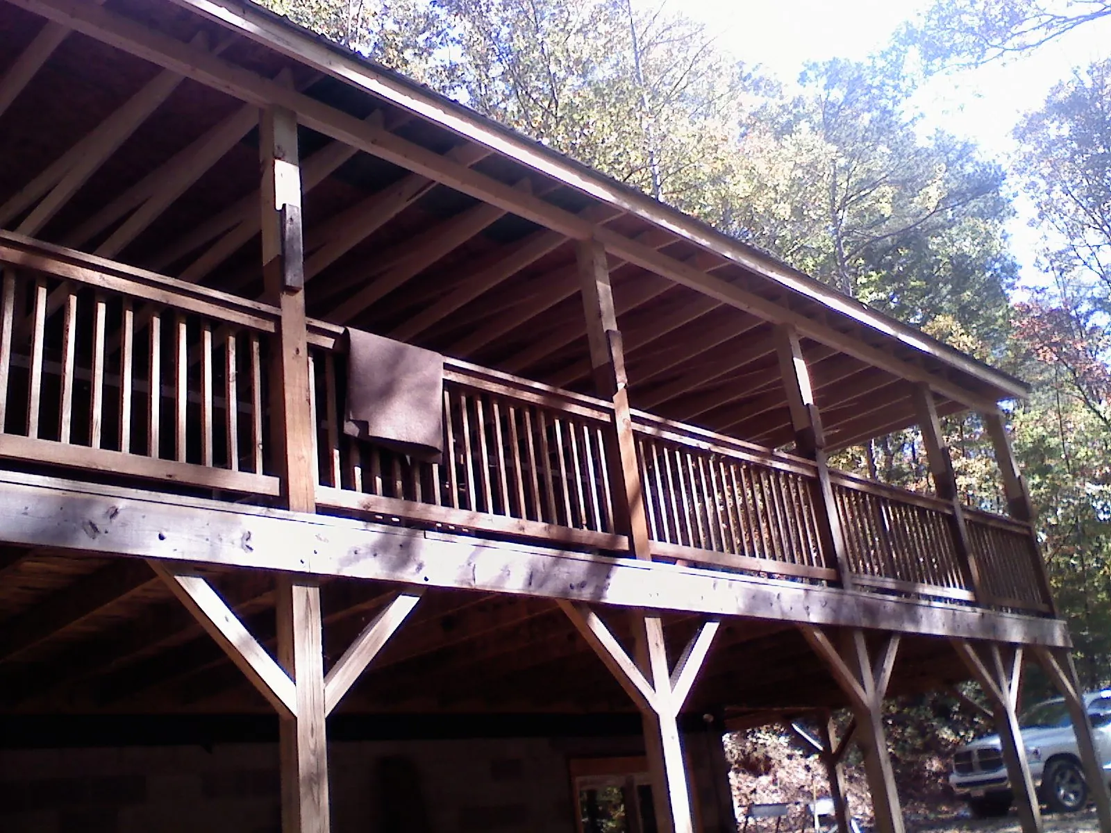 Timber framing under a new elevated porch and deck — Roof Leak Repair in Mc Clellanville by Roofing Brothers